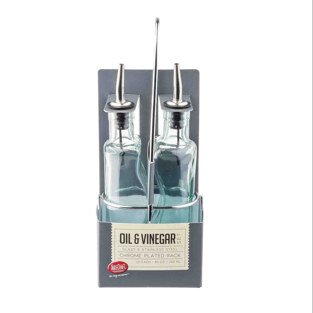 Gemelli Bottle Set (2) 8-1/2 oz. embracing green tint glass bottles (dishwasher safe), stainless steel pourer (hand wash only), chrome plated rack (hand wash only) (must be purchased in multiples of 6 sets)